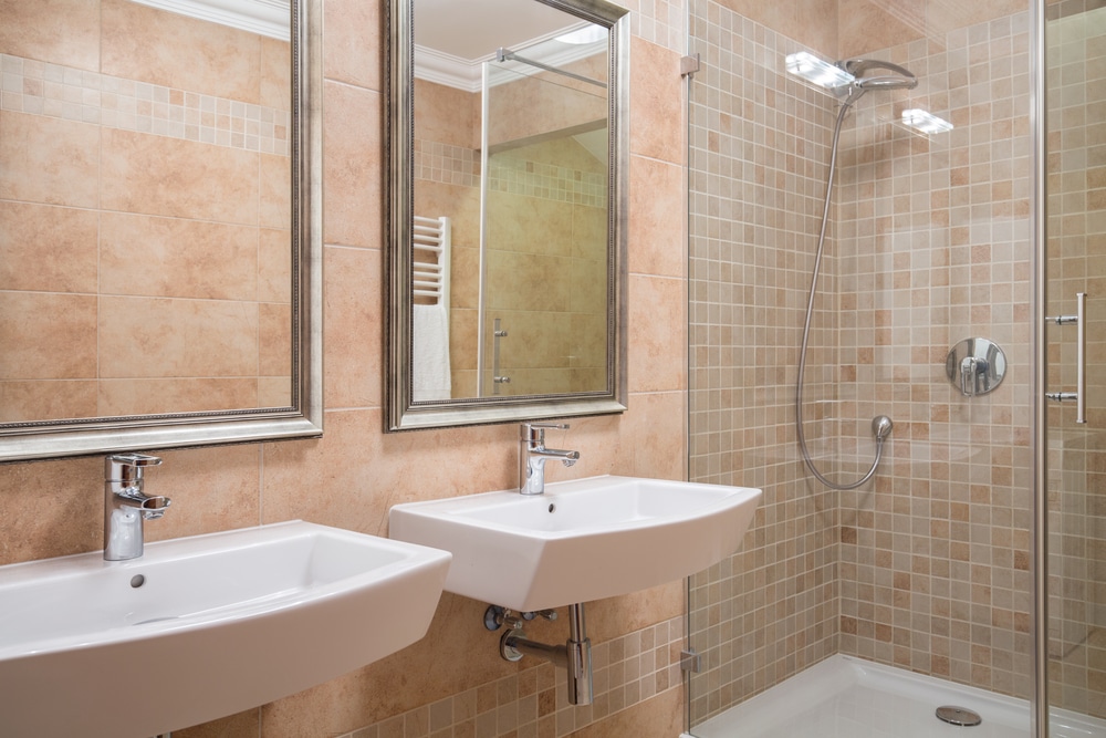 Bathroom remodel with shower and two basins
