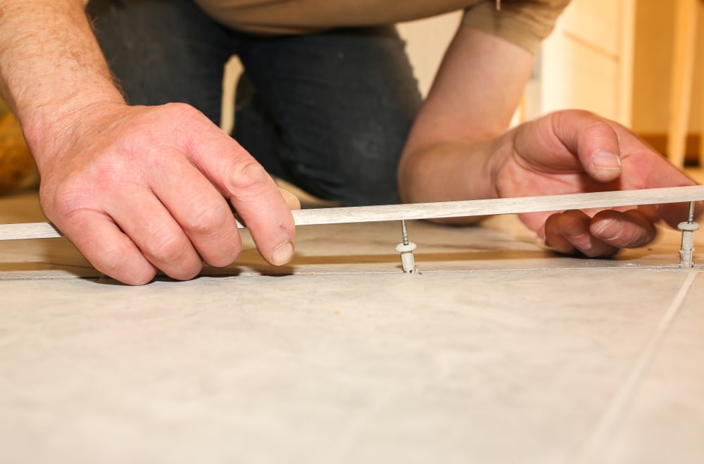Threshold installation during interior renovation work