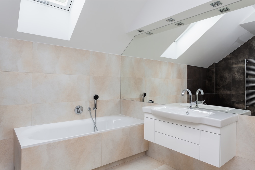 Bath and sink in a new contemporary bathroom