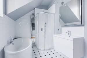 Small bright bathroom with a compact walk-in shower layout