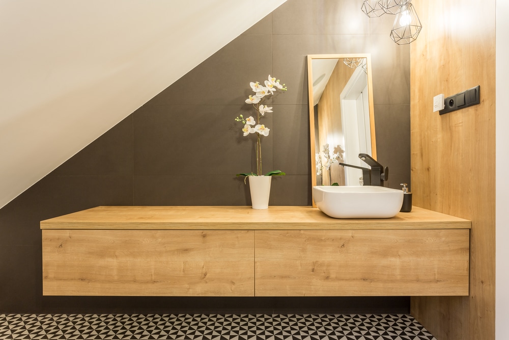 Wooden bathroom vanity with mirror and washbasin