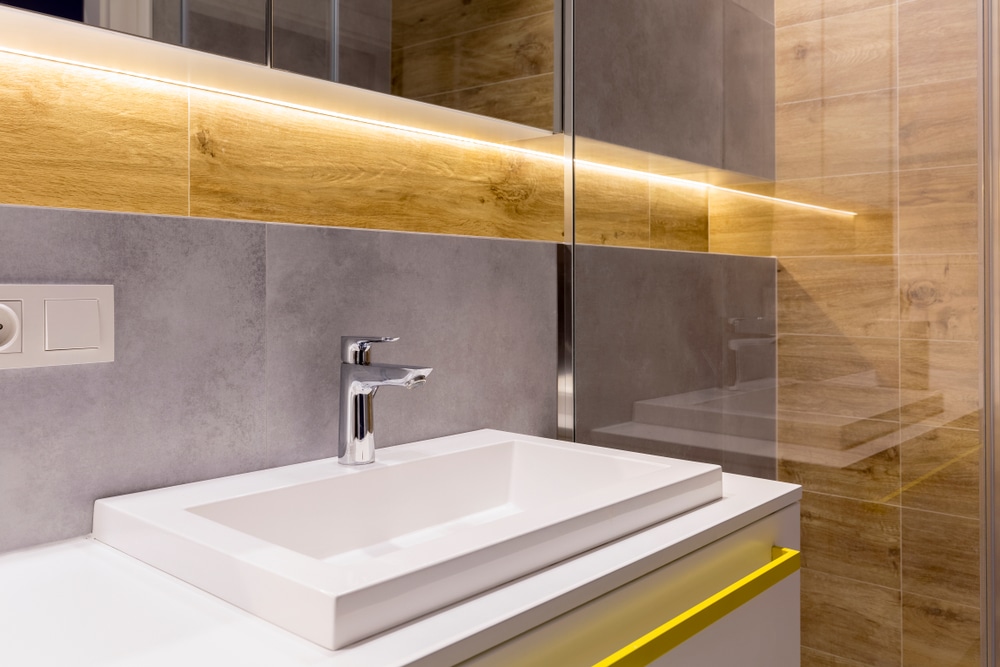 Washbasin and faucet detail in an elegant bathroom remodel