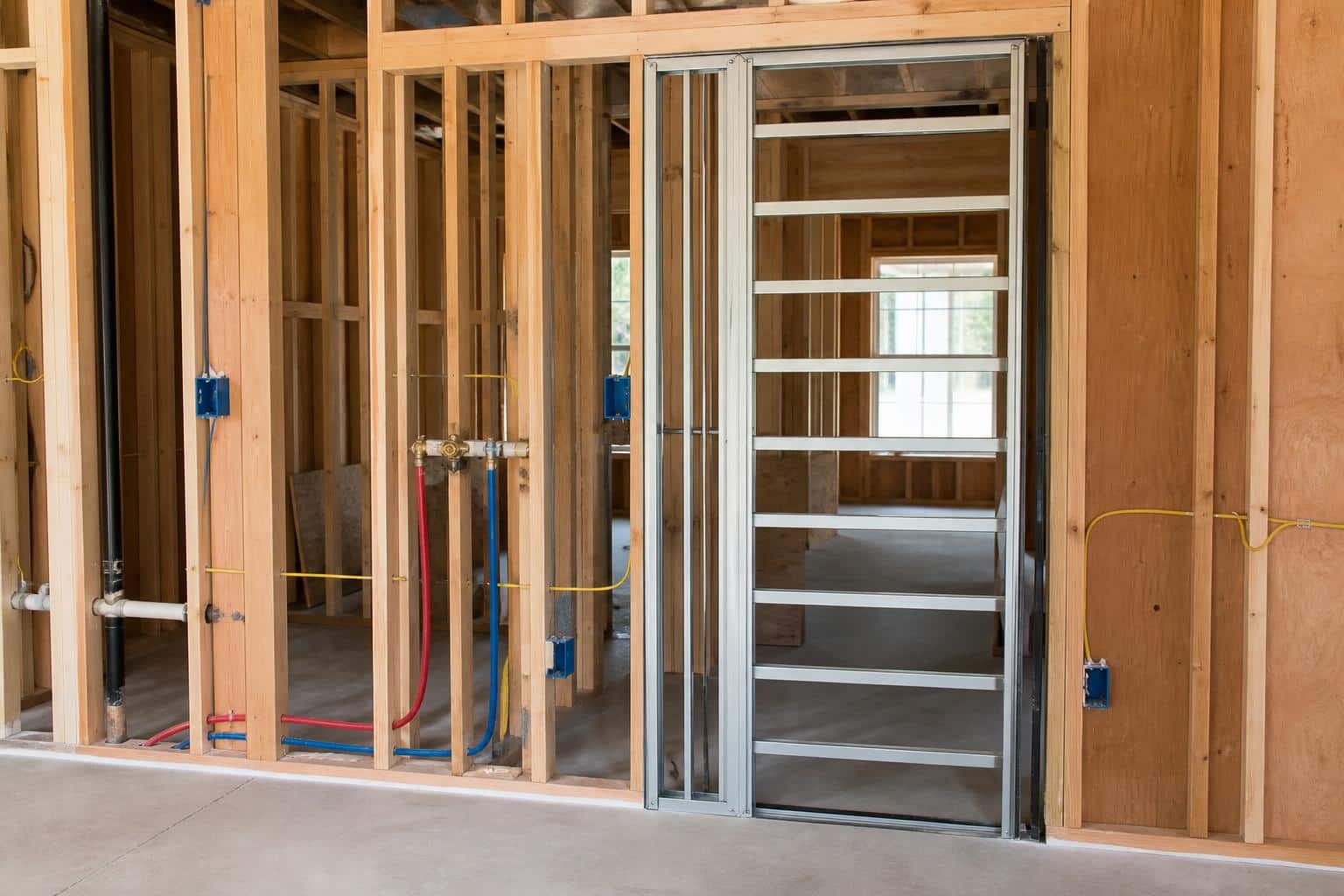 Pocket door partially open in a remodeled bathroom